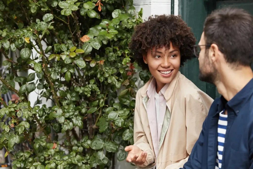 Young woman and man chatting